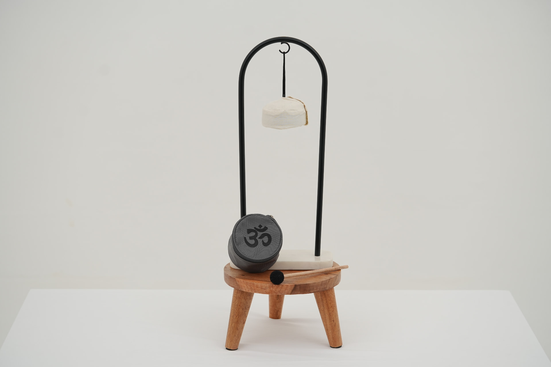 The Mindfulness Bell kit: bell on its stand with mallet and carry pouch.